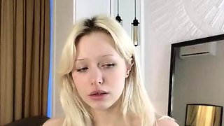 Close up with teen blonde sex doll rubbing her cunt