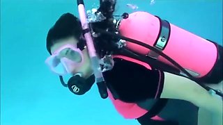pregnant dives underwater
