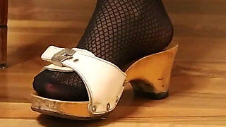 Retro Dangling in Patterned Nylons & Classic Wooden Mules