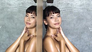 Petite brunette and Thai MILF strip nude