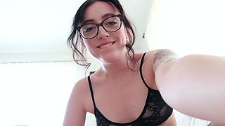 Small titted brunette Sharron with glasses masturbates