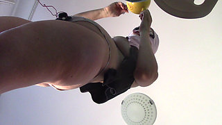 Sexy wife doing housework naked. Brunette, hairy pussy, big ass, big tits. Sexy mom massages herself with a vibrator.