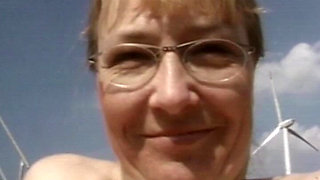 Mature Blonde Masturbates in a Field