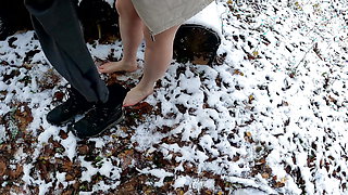 Slapping and pulling her labia in the snow