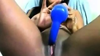 Black girl toys her wet pussy on webcam
