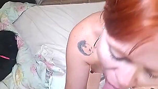 The Redhead Appears on Webcam Swallowing Her Cousin's Cock