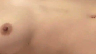 Girl Haruna is an Asian girl with big tits, she lies down on the bed and lets her pussy explore