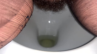 On the Toilet in Pantyhose the MILF Pisses and Then Gives Blowjob