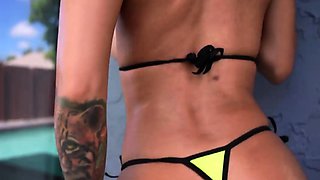 Busty micro bikini Latina gags in pool