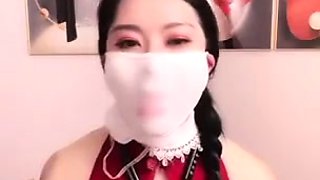 Chinese sexy girl use ballgag under tight mask