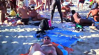 A crazy gangbang in the middle of the beach