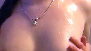 Busty curly brunette with big boobs fucks on couch