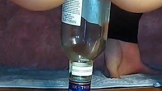 Sister Jumping on a Giant Bottle