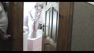 Naked woman sexy blonde in bathroom. Man roommate in short T shirt this watches, masturbate cock and cum. Cumshot. Old and young