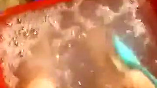 Scrubbing my big feet and legs with a brush