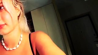Close up with teen blonde sex doll rubbing her cunt