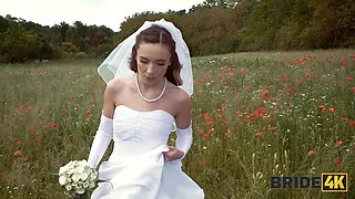 BRIDE4K. Pretty brunette bride fucks a horny shepherd in a summer field