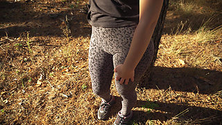 Girl Teases Her Big Cameltoe in Leopard Leggings Outdoors