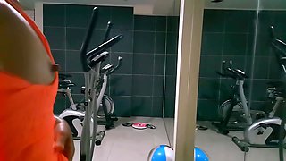 Sexy Hairy MILF Trains in the Gym Without Panties and with Plug in Asshole