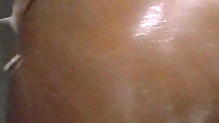 Muscular Woman Piss in the Shower