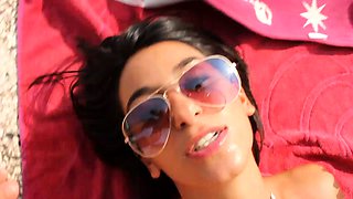 A super sexy brunette massages her big boobs