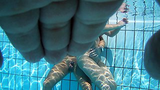 Wild amateur lovers getting naked in the public pool