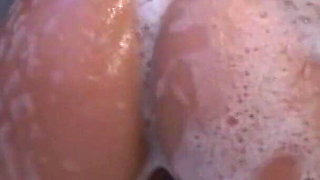 The Blonde Pussy Has Fun in the Bathtub