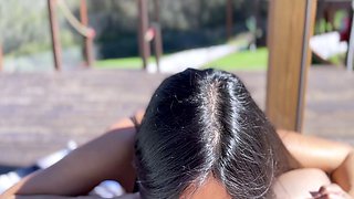 Amazing busty brunette slut doing blowjob outdoor