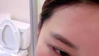 Asian babe sucking and jerking two hard dicks