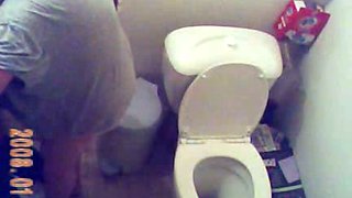 Horny granny gets caught on tape by me when peeing in the toilet room