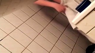Toilet voyeur spying on a sexy young babe with a perfect ass