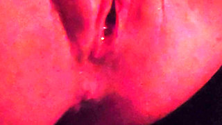 Muscular milf jerks off her big clit and pumps juice from horniness