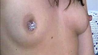 Small titted brunette teen fingering on the bed