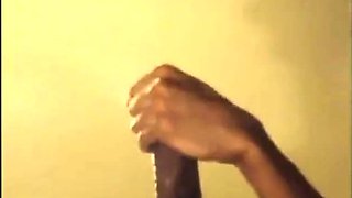 Black guy jacks off his big cock and cums hard