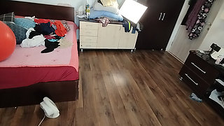 Amateur wife has fun trying on clothes and cutting them.