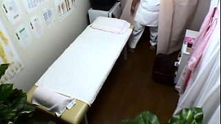 Pretty Japanese girl with sexy legs enjoys a nice massage