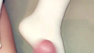 Footjob in Long Socks and Cums on Socks