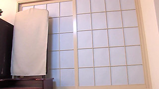 Mature Japanese whore loves blowing cock under the shower