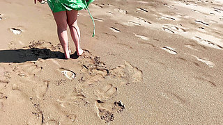 Dominant woman having fun on the beach