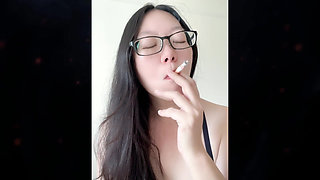 Real Smoking Asian Girl POV: Coming Home to Hot Asian Flashing Her Perky MILF Boobs While Smoking Little Cigars