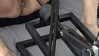 A Mature MILF Masturbates with a Sex Machine