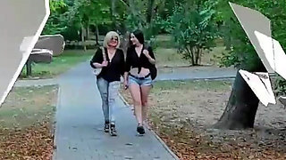 Two Lesbian Mistresses Are Strolling Through the Park