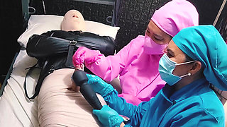 2 sadistic nurse tormenting slave with sounding
