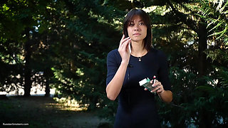 Sweet Russian Beauty Smoking Cigarette in Nature
