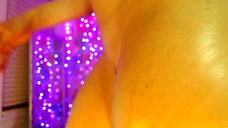 Blonde mature with big boobs masturbates in bed