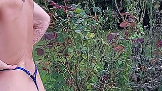 Watch 77 Years Old Martina Alsmost Naked in Her Garden