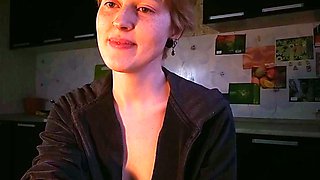 Blonde Teases Tits in Kitchen