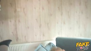 Faux hostel - surprise crevasse in couch makes chubby chick grin