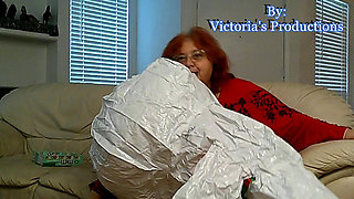 BBW Mature Redheaded Nurse Vicki Blows up Inflatable Snowman for You