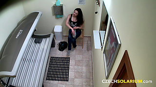 Czech Solarium 176: Adult Brunette Shows off Her Tight Pussy in the Solarium